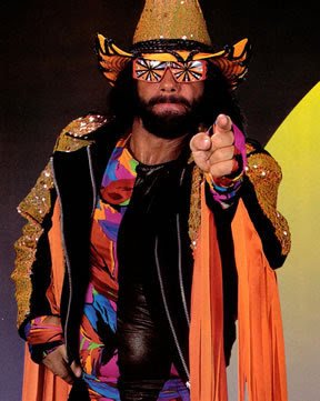 "Macho Man" Randy Savage posing in his iconic colorful gear with sunglasses and cowboy-style hat.